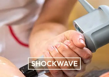 Showing shockwave chiropractic treatment